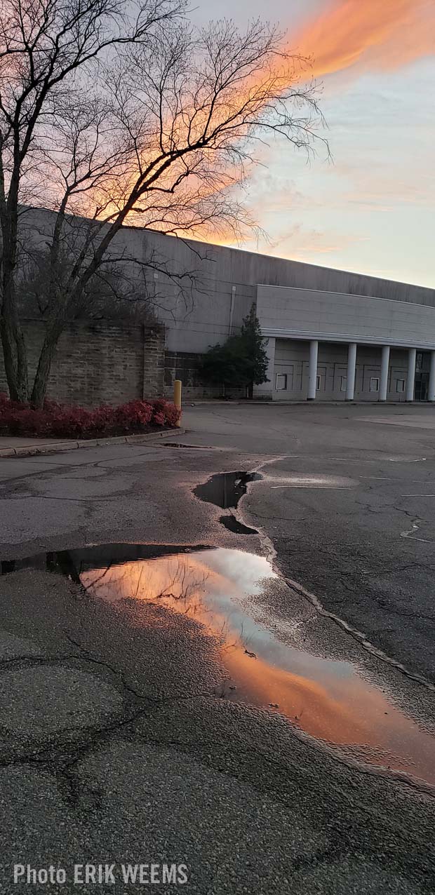 An empty mall oily mud pubble and sunset